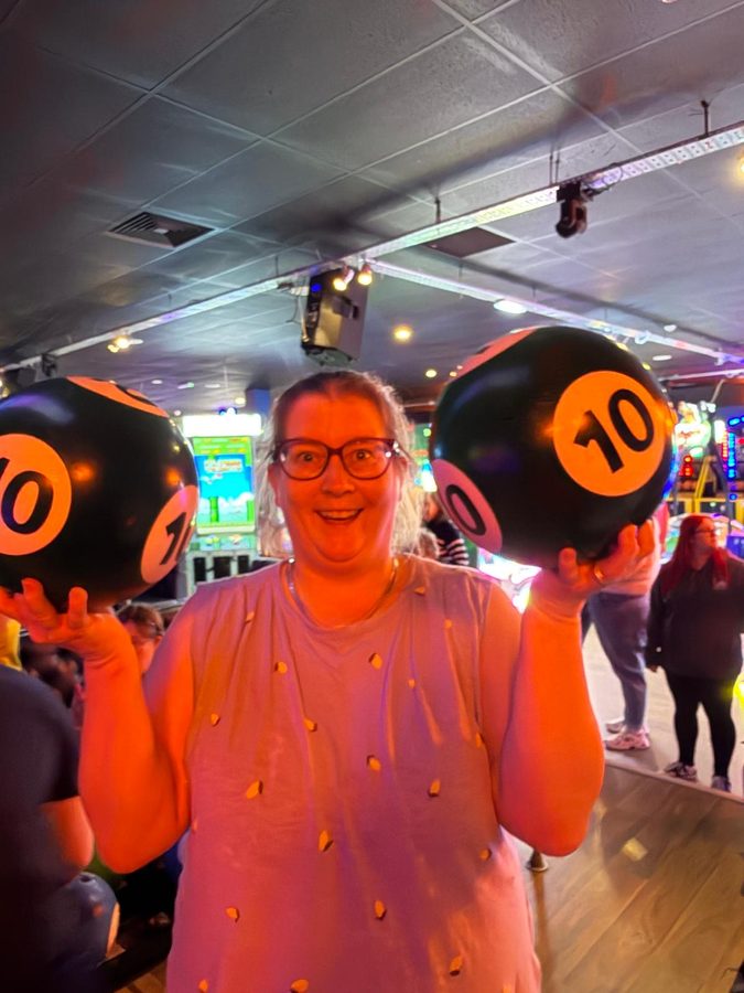 A member enjoying a bowling social evening